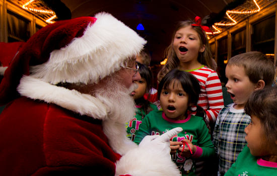 Santa and children on train